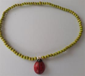 Dětský náhrdelník z dřevěných korálku dekorace Beruška